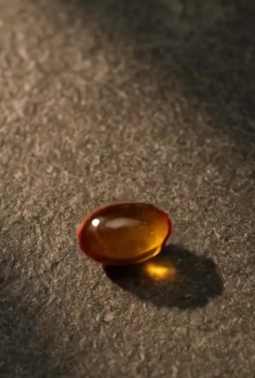 Softgel close-up from the product ad
